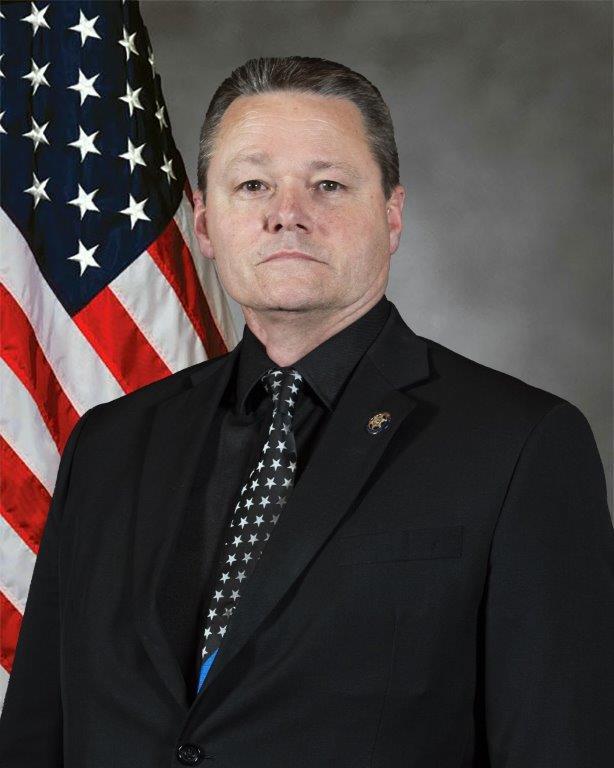 Professional Picture of Undersheriff Eric Smith with Flag Background