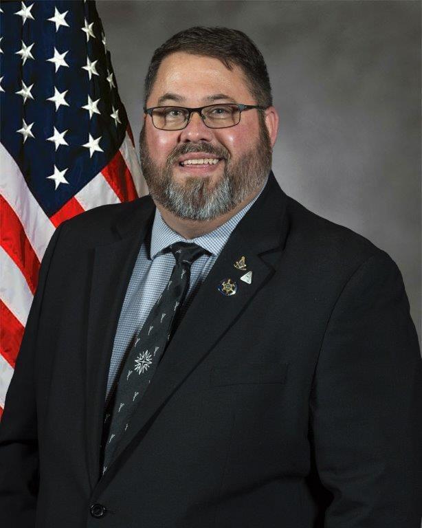 Sheriff Thomas L Johnson Professional Picture with Flag Background