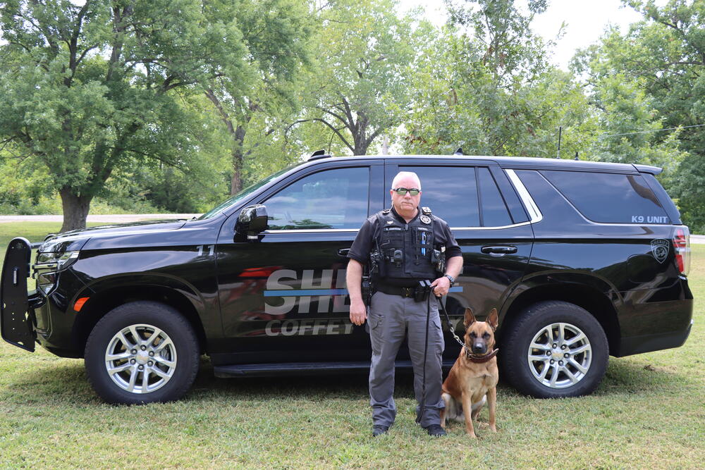 Cpl./K9 Handler Donnie Anderson with K9 Doni